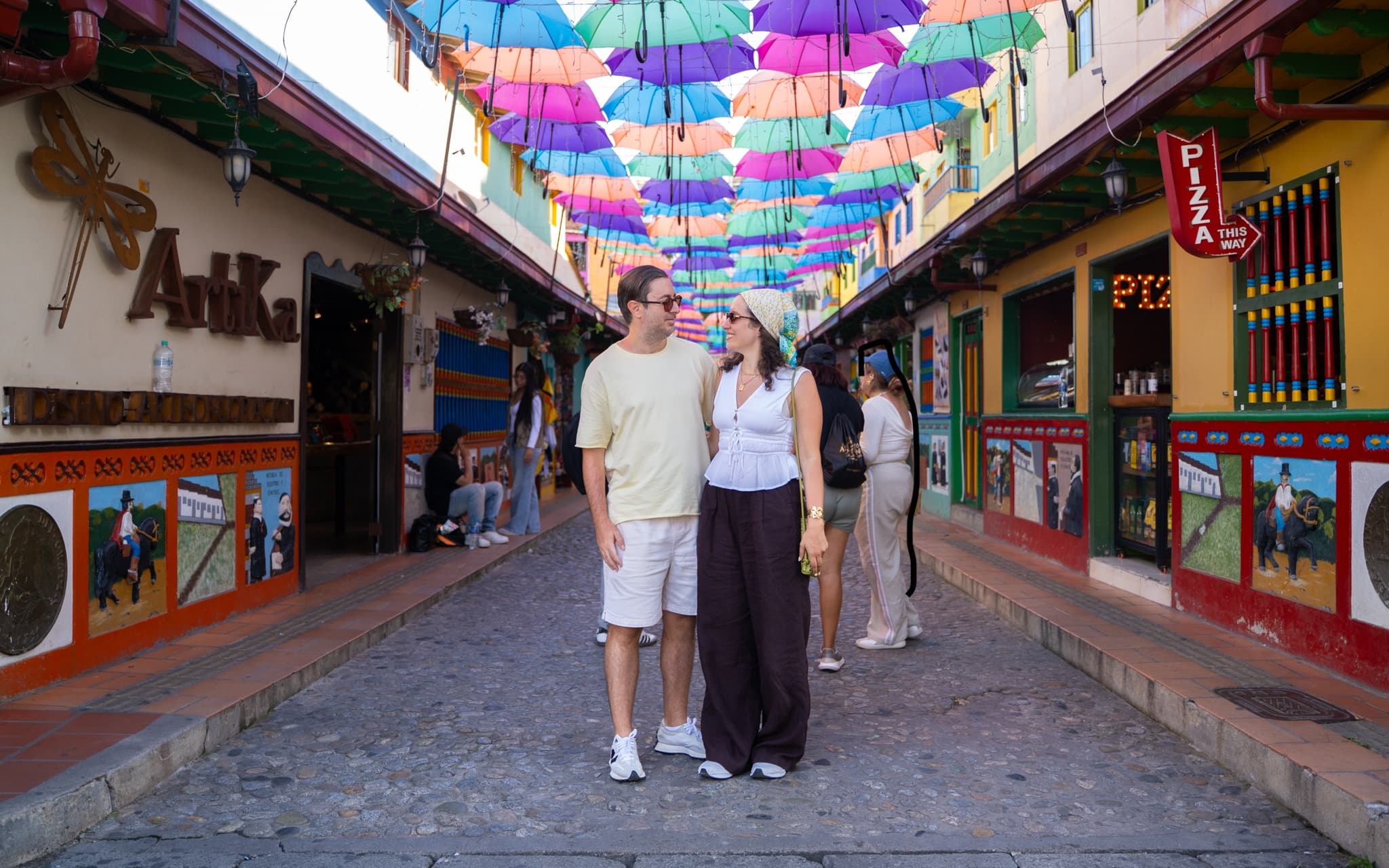 Umbrella street in Guatapé, with its colourful zócalos